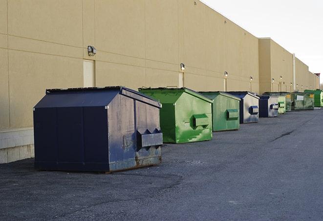 large construction waste containers in a row at a job site in Azusa